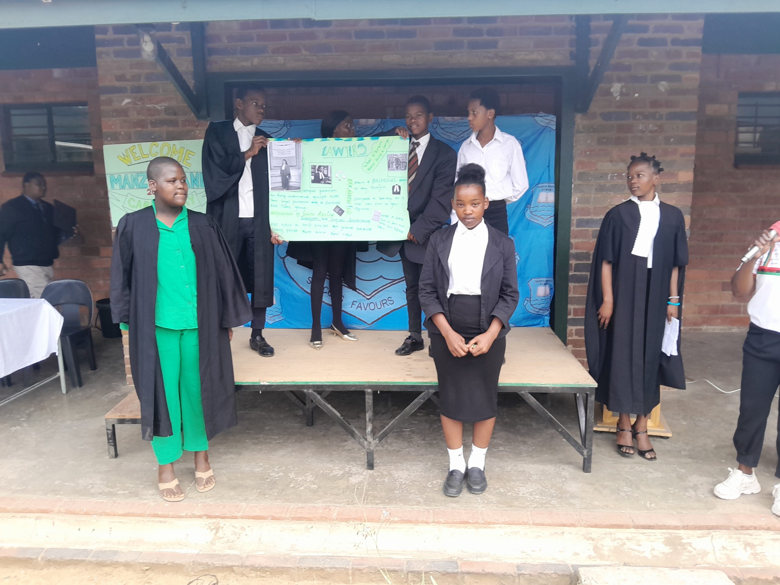 Future lawyers and judges presenting their Career Day research
